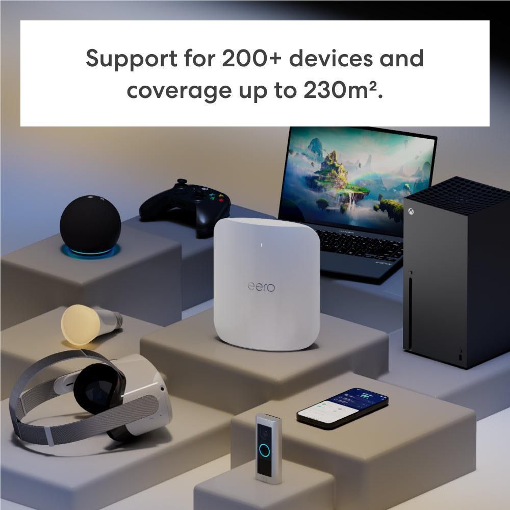 eero Max 7 mesh Wi-Fi 7 router unit on tabletop with other devices