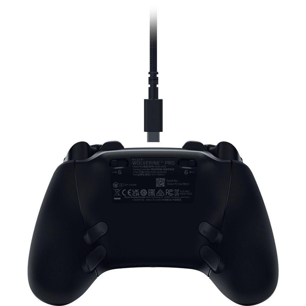 Black gaming controller back with printed labels and charging cable