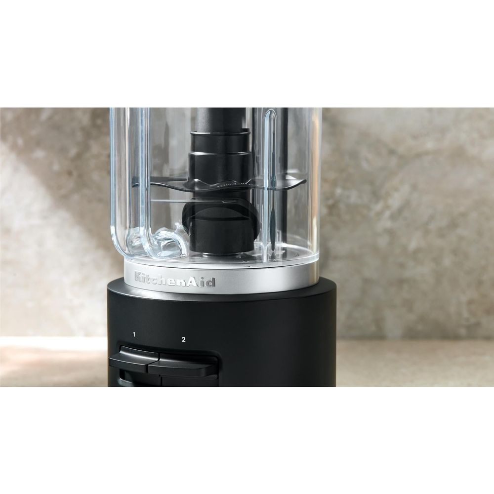 KitchenAid food chopper with clear container and black control switch