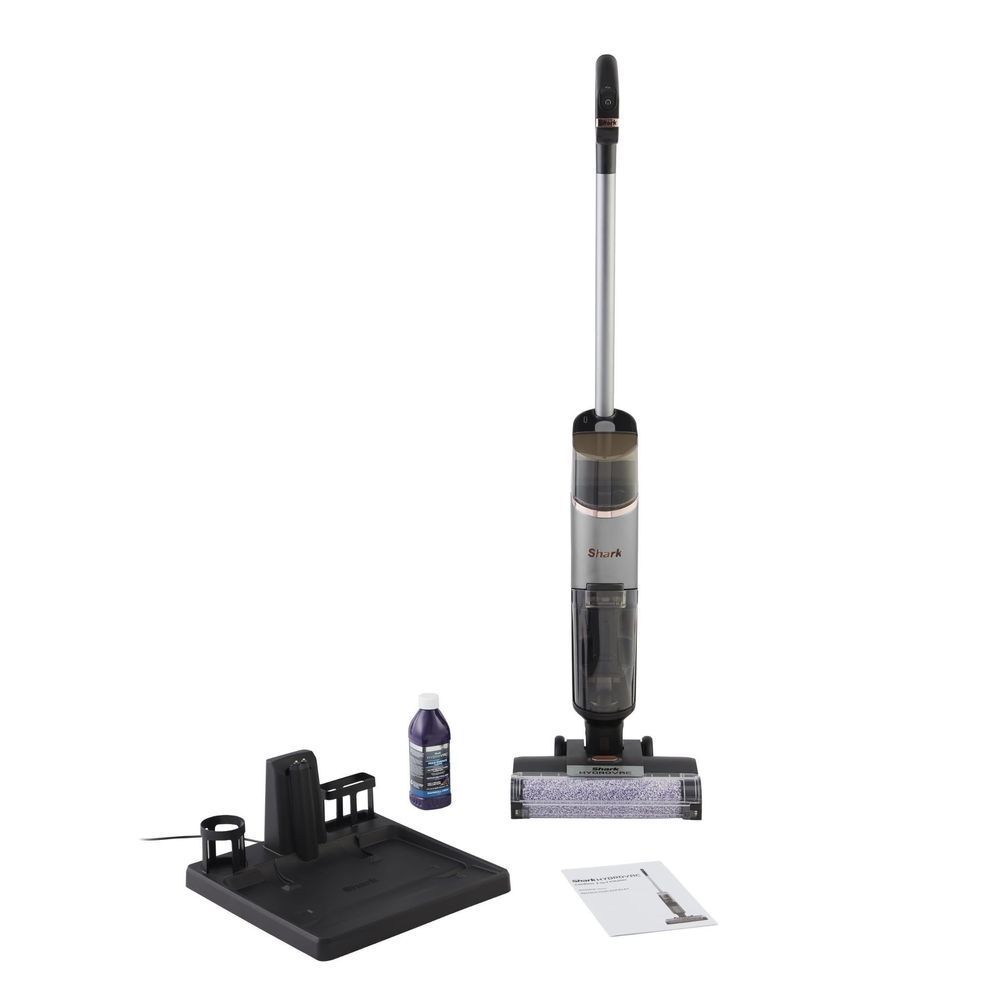 Cordless wet/dry vacuum with floor nozzle, base dock, and included accessories
