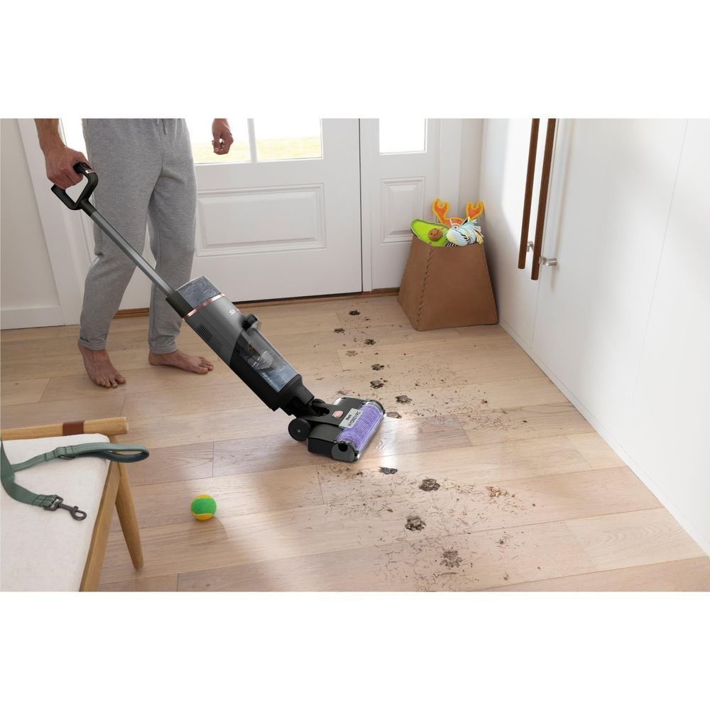 Cordless wet/dry vacuum using a wide floor brush head on hard flooring