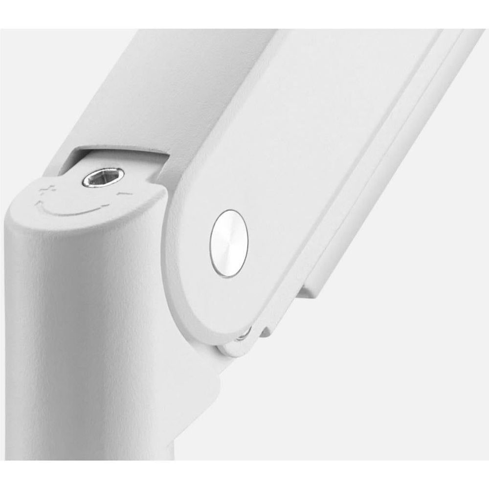 White monitor arm adjustment knob and mounting point on upright post