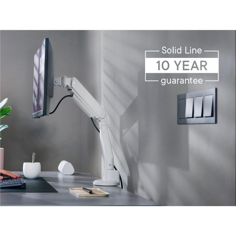 White monitor arm with Solid Line 10 YEAR guarantee label