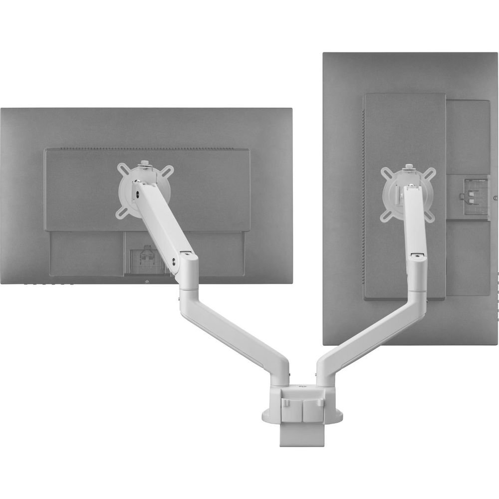 White dual monitor arm installed on two displays with V-shaped positioning