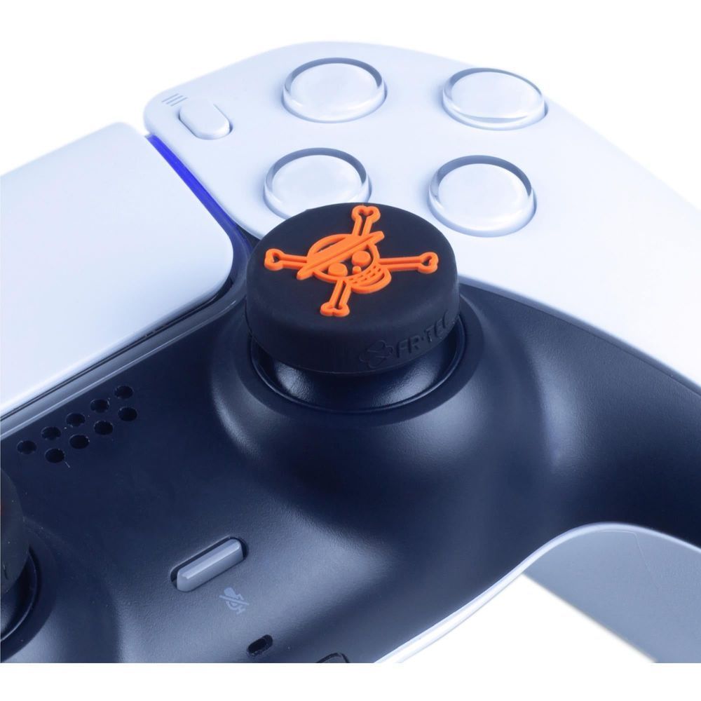 Orange-and-black thumbstick grip on a PS controller joystick with logo