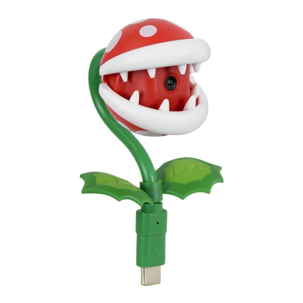 Piranha plant camera accessory close view with red red-spotted head, green stem, and leaves