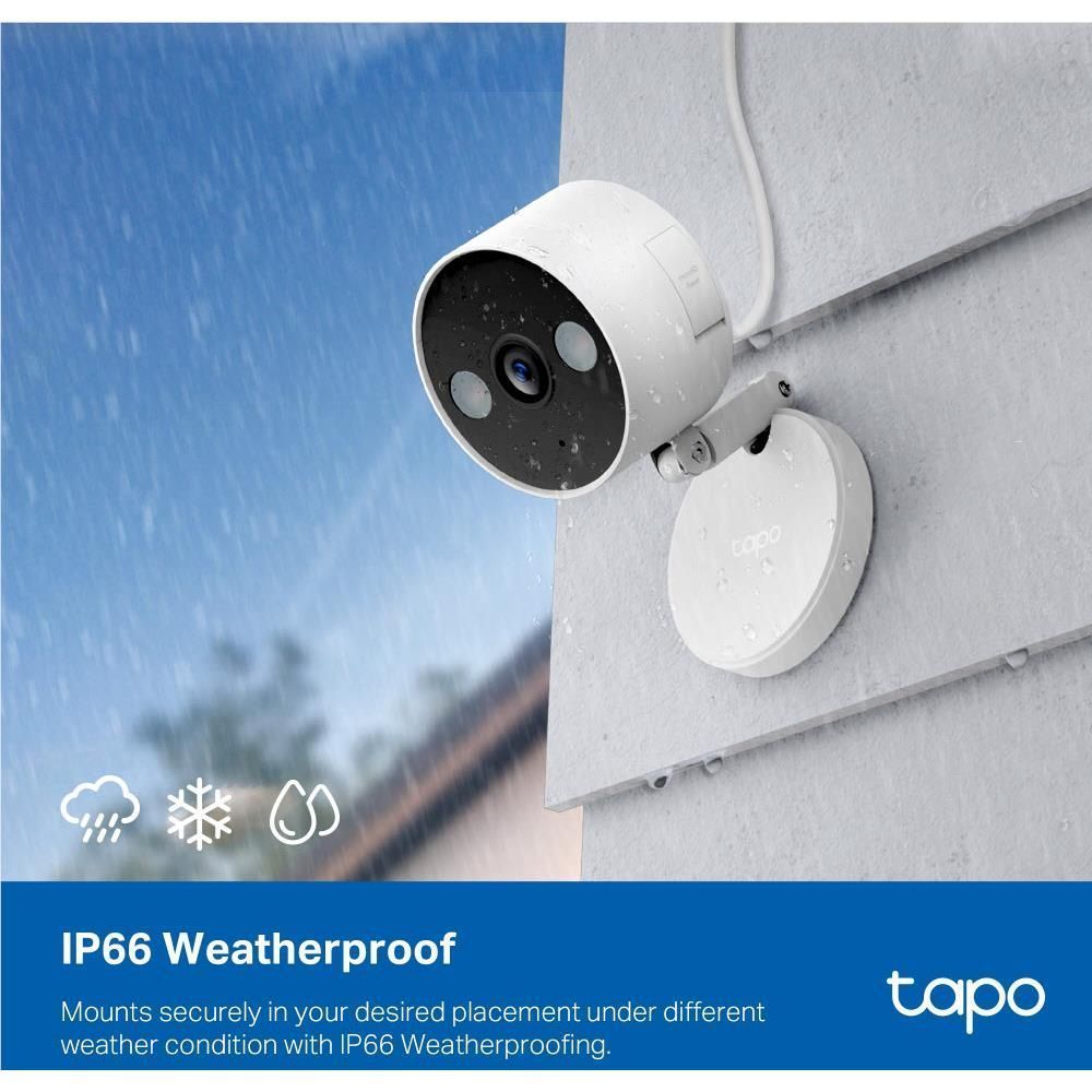 Outdoor security camera mounted to a wall with weatherproof housing and cable