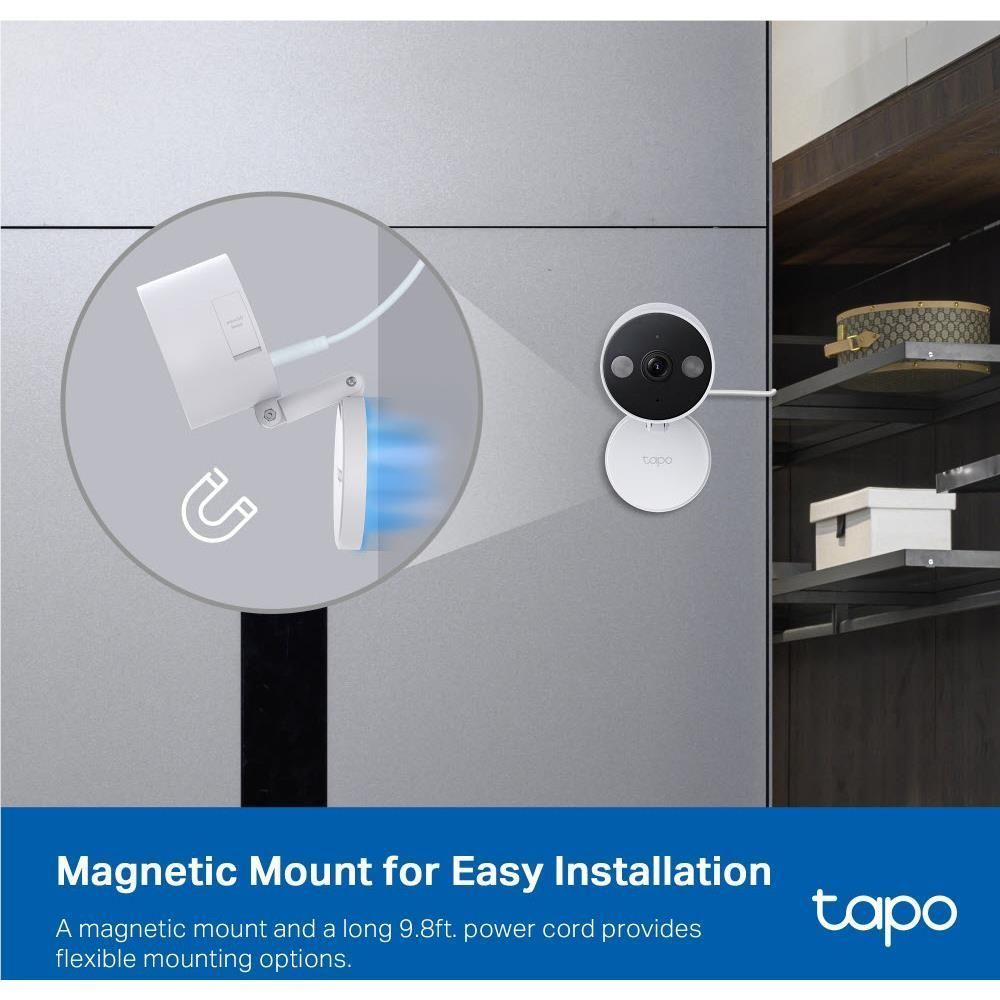 Security camera with magnetic mount attached to an exterior wall near an outlet