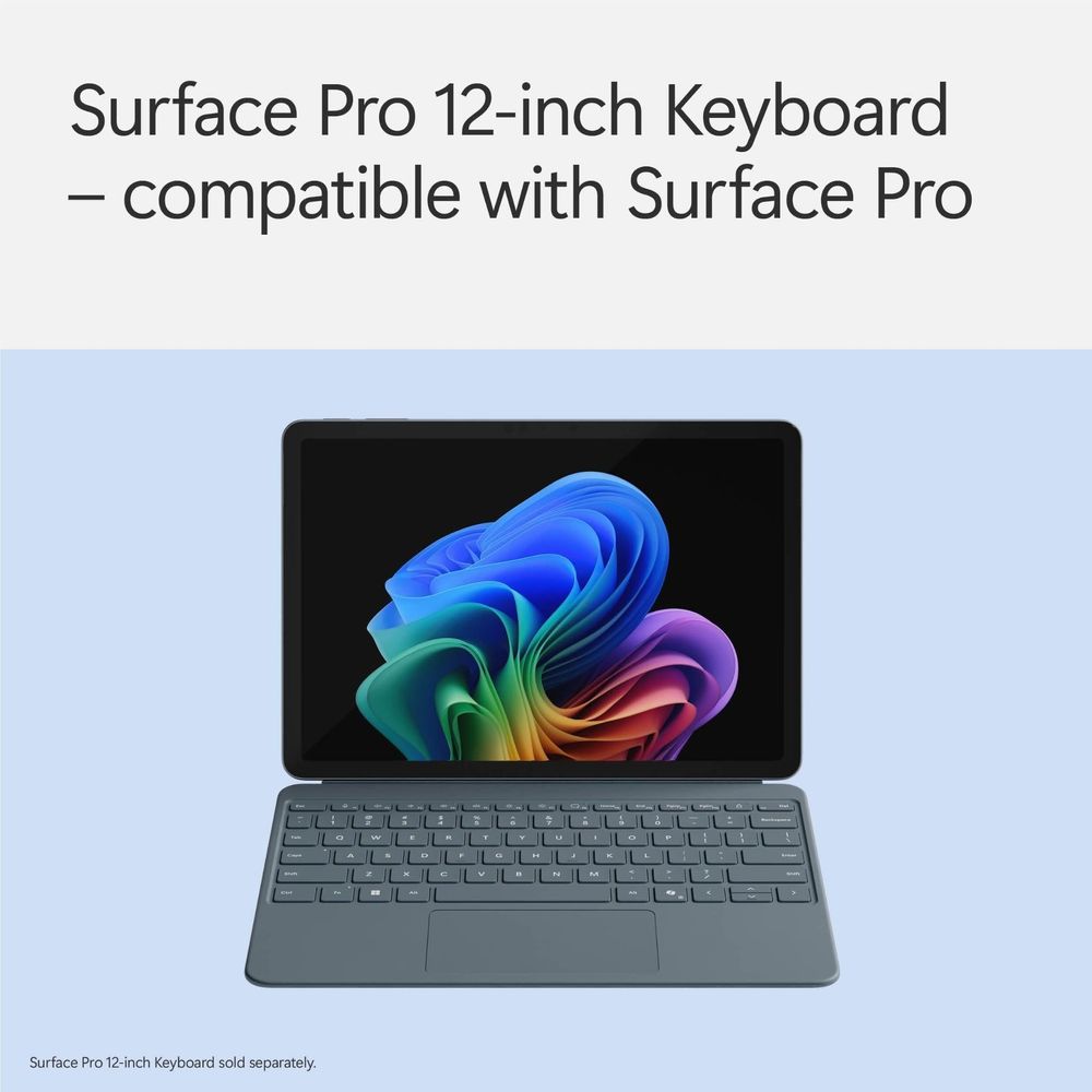 Ocean blue keyboard with tablet displaying colorful abstract wallpaper