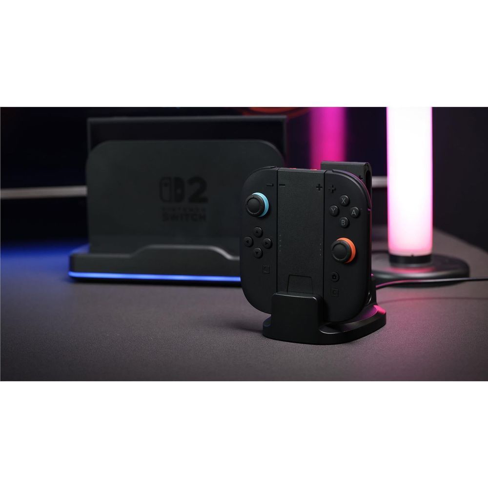Black dual grip charging dock with controller seated and glowing LED status lights