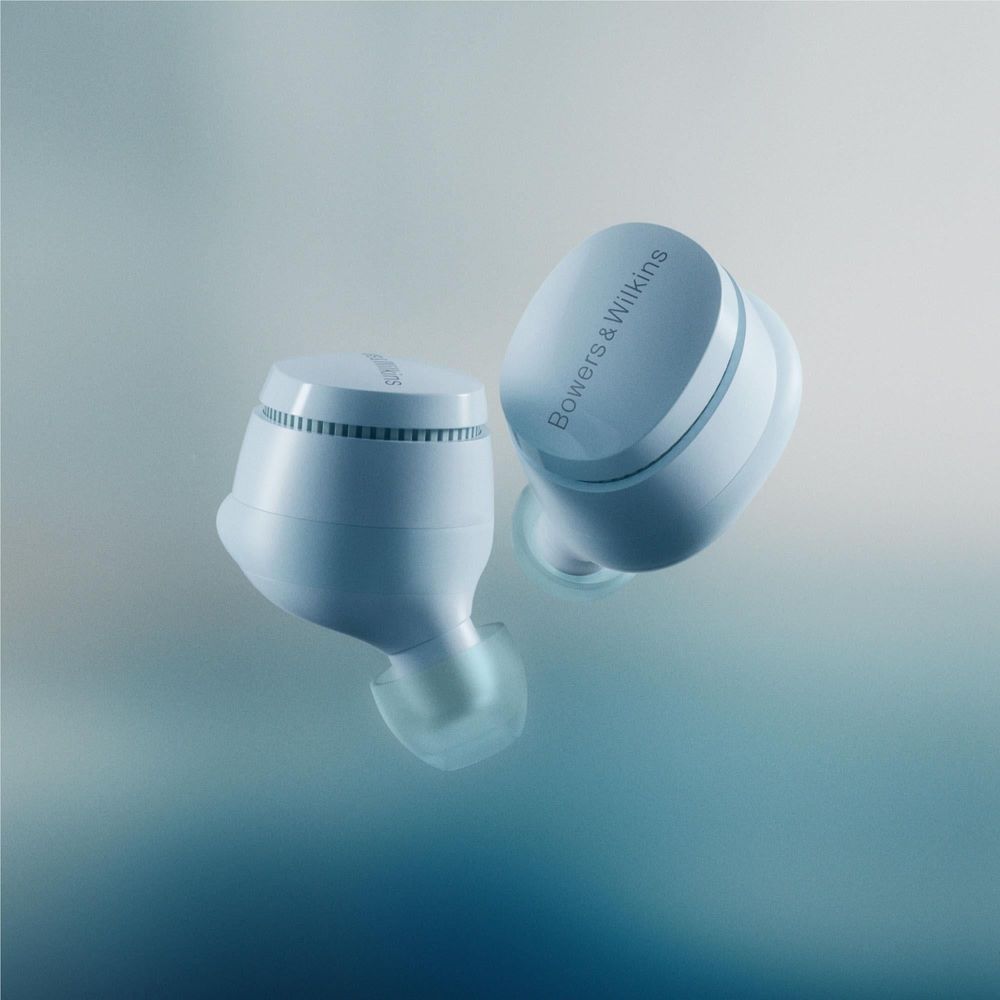 Glacier Blue Bowers & Wilkins TWS earbuds with stems, angled product view