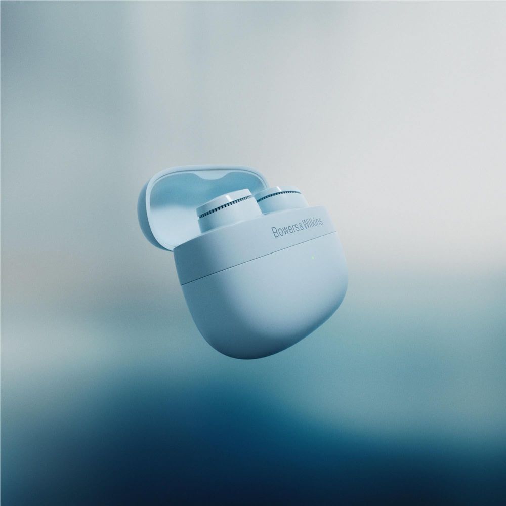 Glacier Blue Bowers & Wilkins charging case with one earbud resting inside