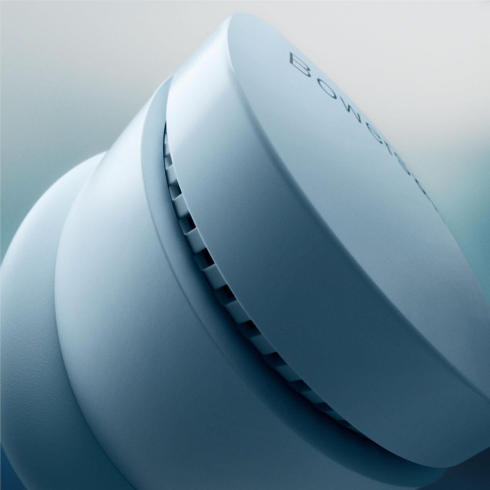 Glacier Blue earbud side view with speaker grille detail
