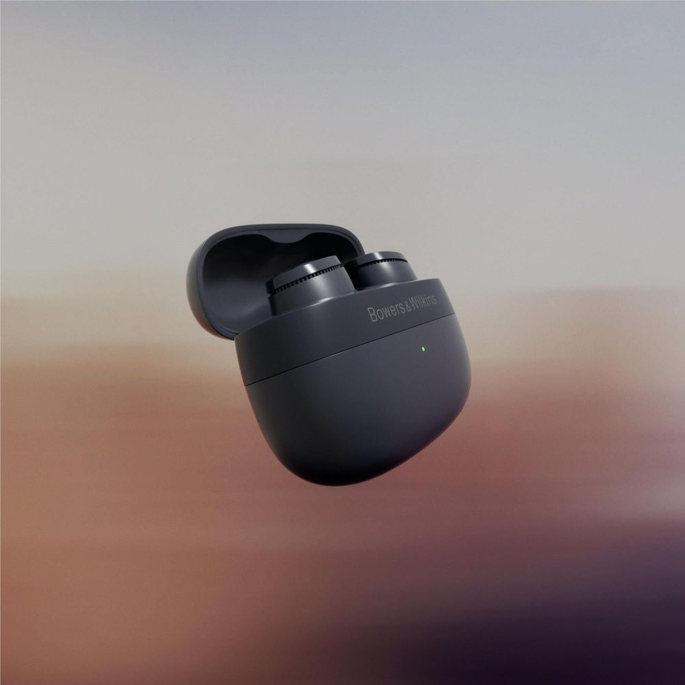 Storm grey PI6 ANC TWS earbuds partially in charging case