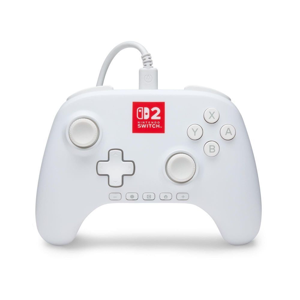 White wired game controller with analogue sticks, D-pad, and ABXY buttons