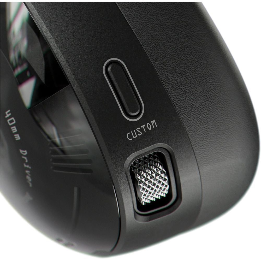 Black earcup panel with custom speaker grille detail on over-ear ANC headphones