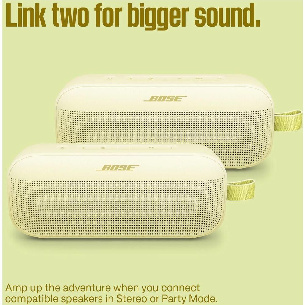 Two-piece view of citrus yellow portable speakers with lime carry straps