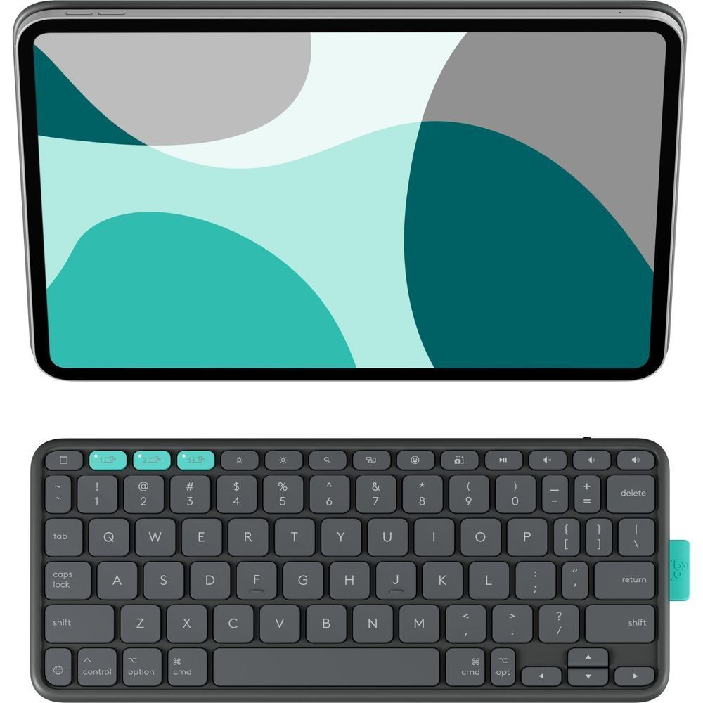 Graphite folio case open with tablet screen and built-in keyboard, teal accents
