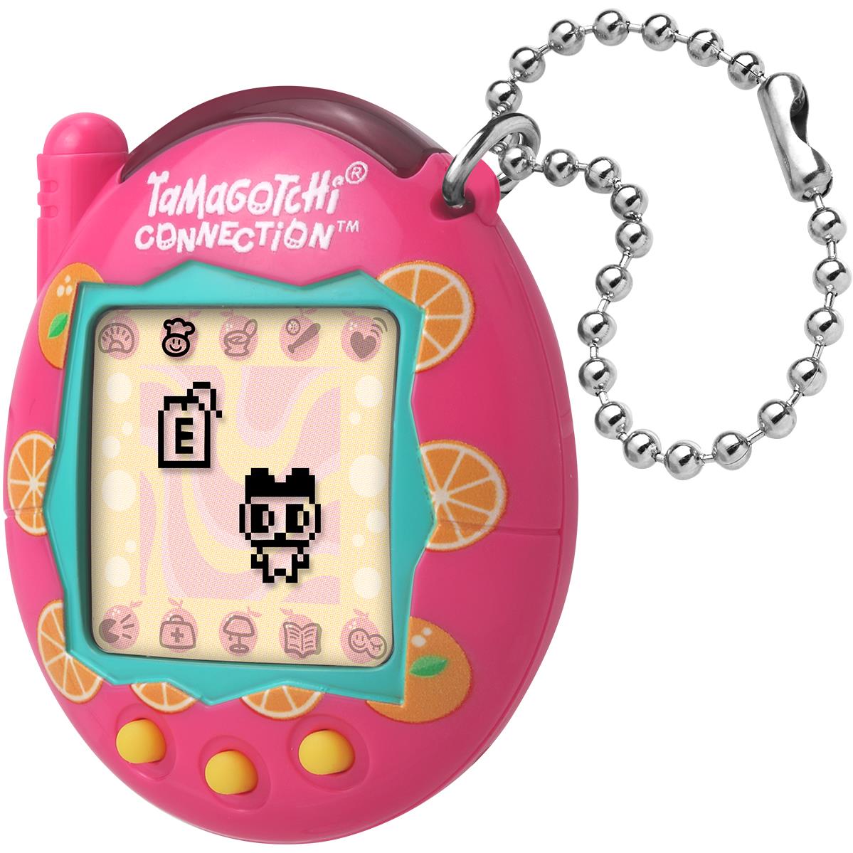Pink handheld virtual pet with citrus shell, tilted screen, and dangling metal keychain
