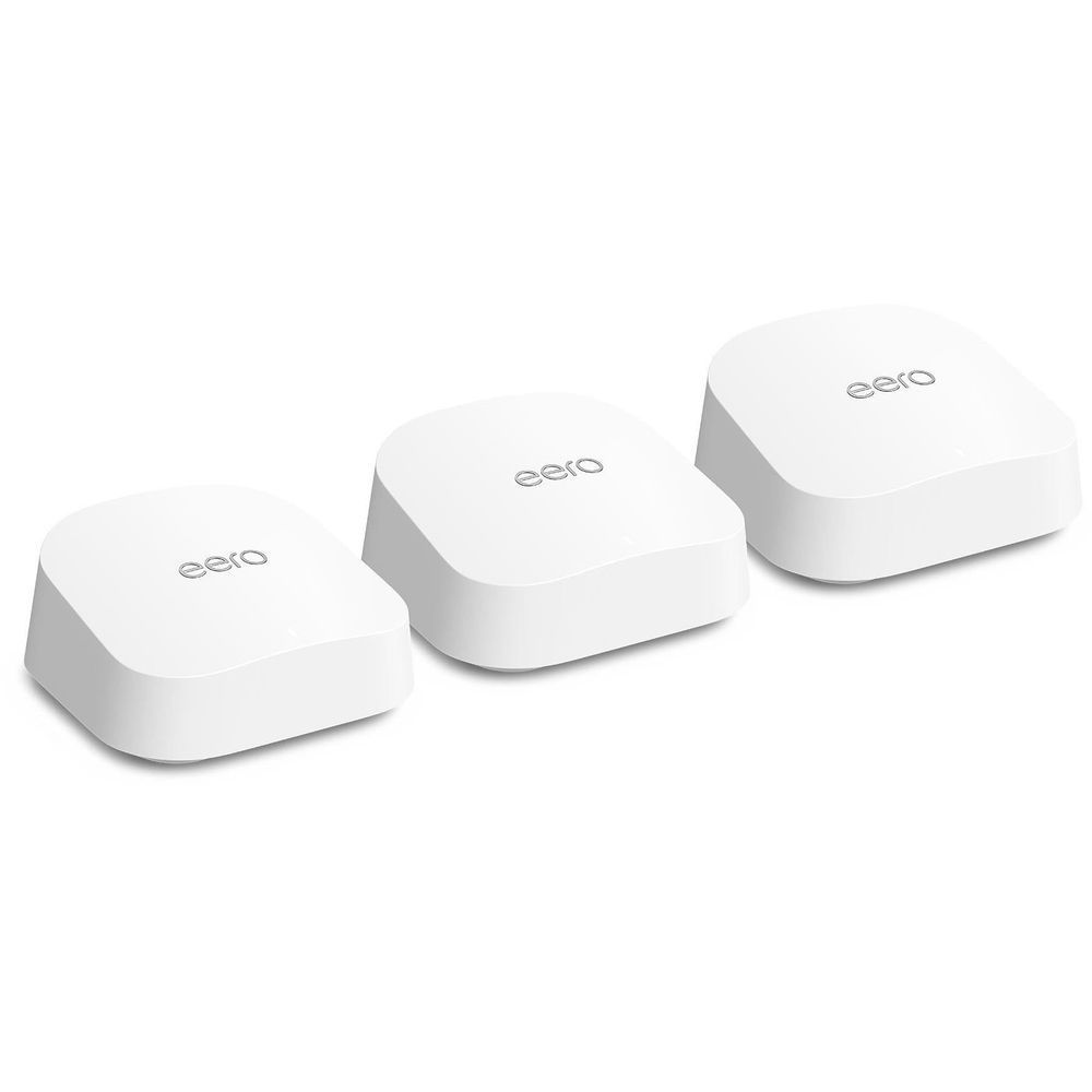 Three white eero Wi-Fi 7 mesh router nodes with compact dome design