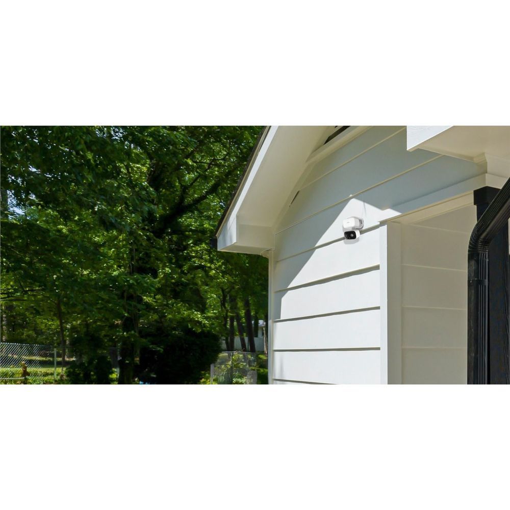 Wall-mounted pan-tilt security camera with black-and-white housing