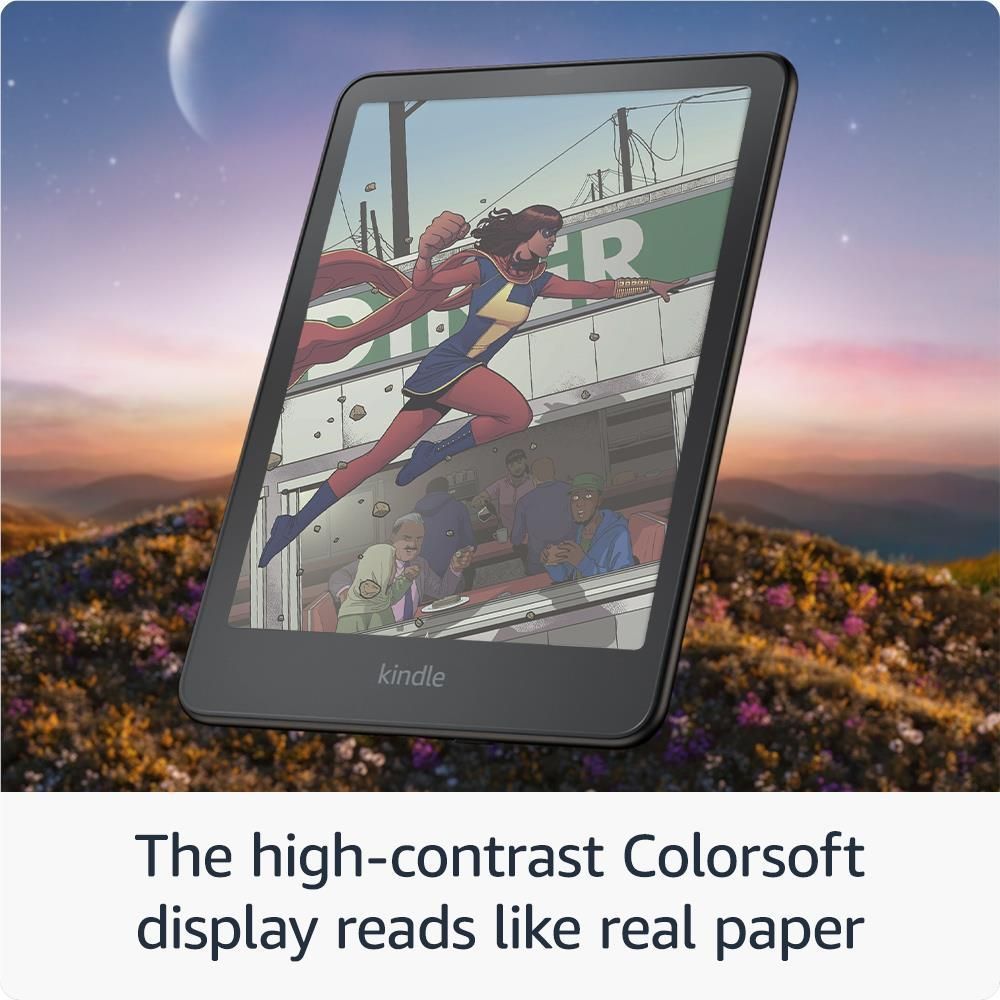 Black Kindle e-reader angled, color display showing an illustrated scene