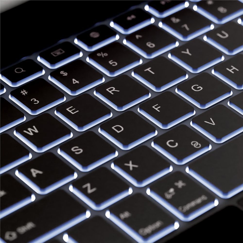 Backlit blue keys on a black keyboard case with visible trackpad area.
