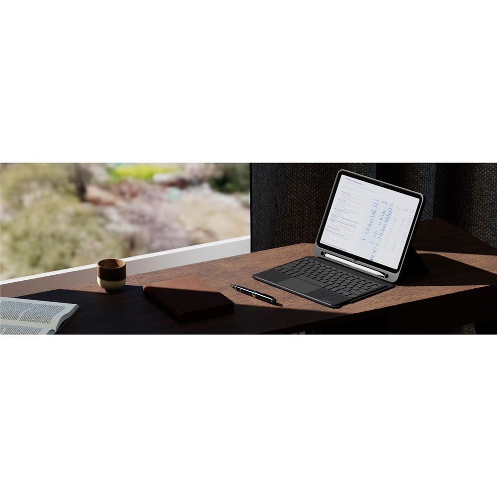 Black keyboard case propped up with iPad screen and built-in trackpad.