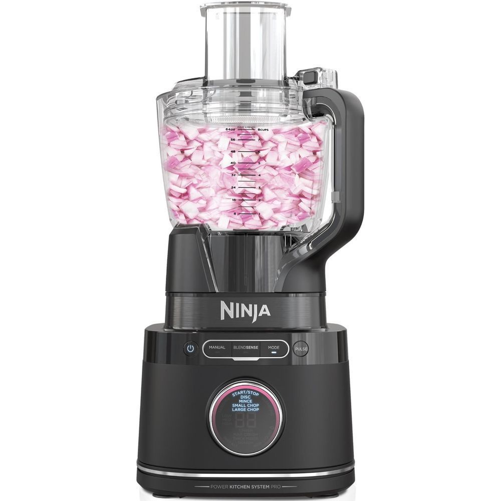Ninja blender with clear pitcher holding chopped purple onions