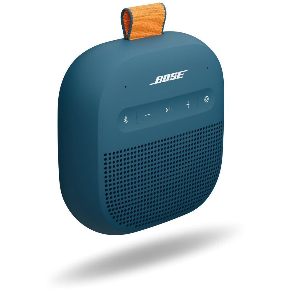 Portable Bluetooth speaker with blue casing, orange handle strap, control panel and Bose logo.