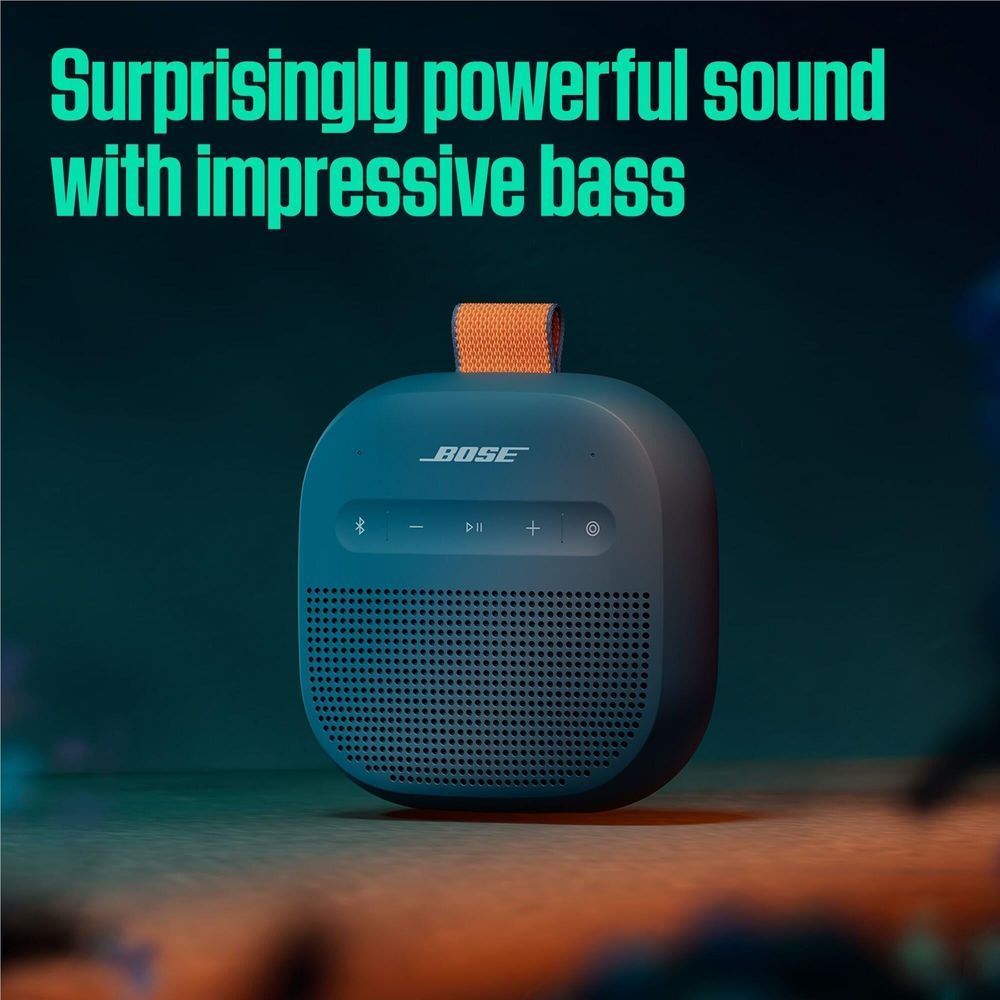 Portable Bluetooth speaker in blue with orange strap, Bose logo, front grille.