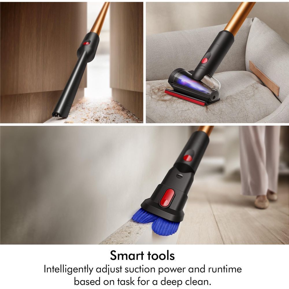 Dyson stick vacuum with floor brush cleaning carpet and couch, black and bronze