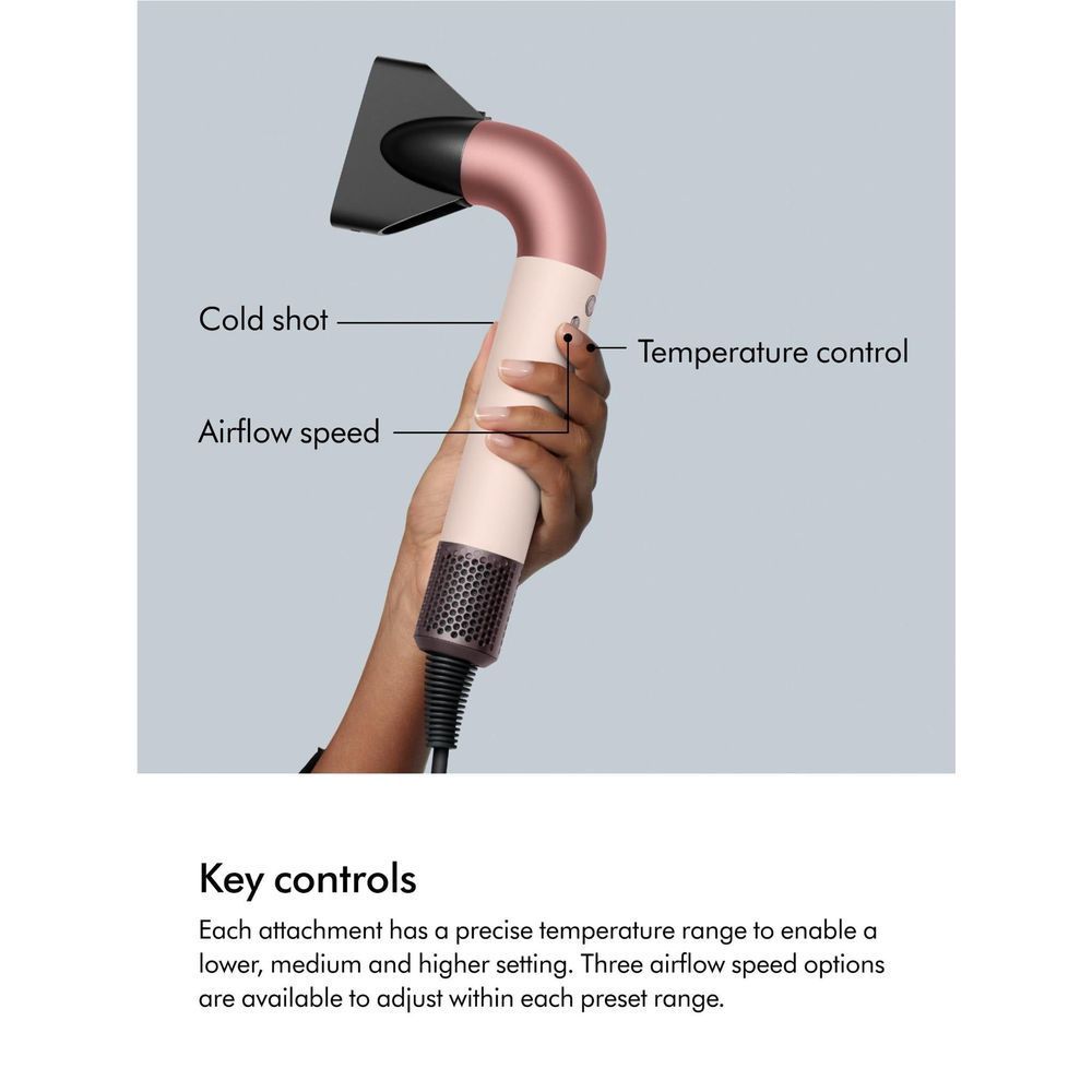 Ceramic pink hair dryer with black nozzle and temperature control