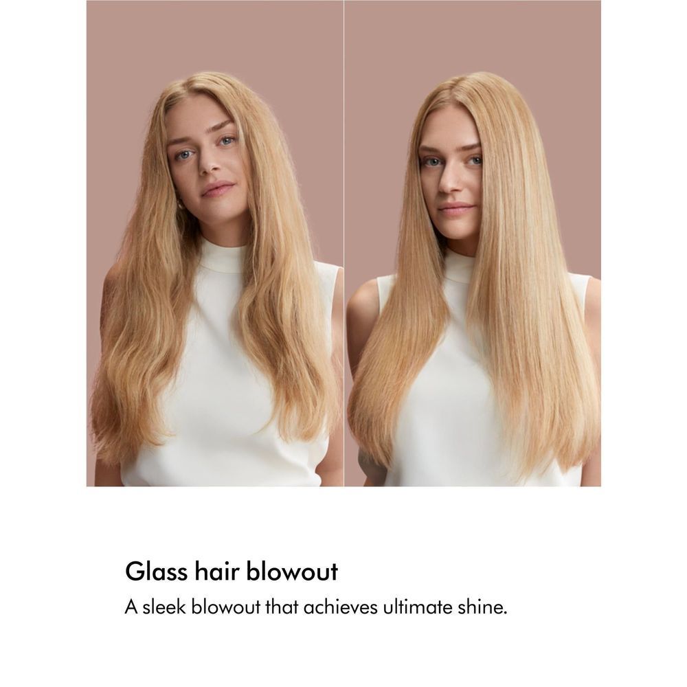 Blonde hair styled smooth and shiny with a rose-gold hair dryer