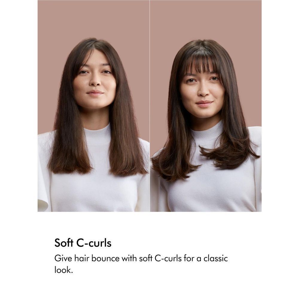 Dark hair styled with soft curls using a rose-gold hair dryer