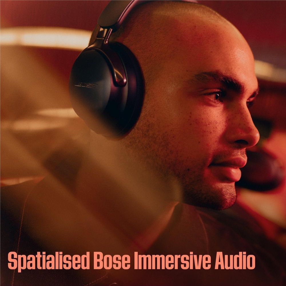 Bose QuietComfort Ultra noise-cancelling headphones on a person, close side view