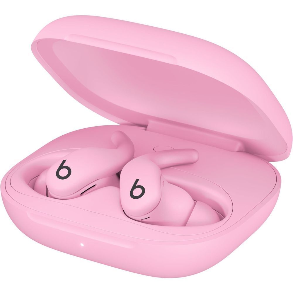Pink wireless earbuds resting in open charging case