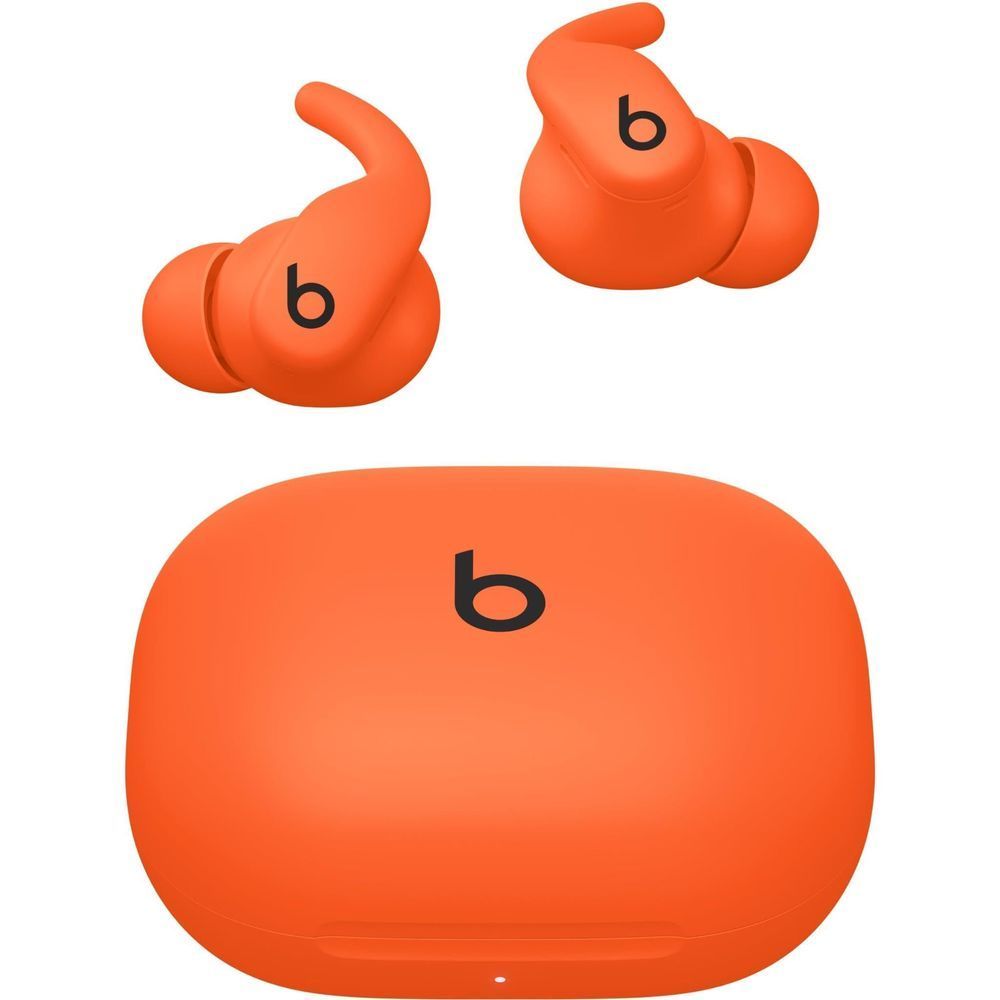 Beats Spark orange wireless earbuds with charging case lid and earbud pair