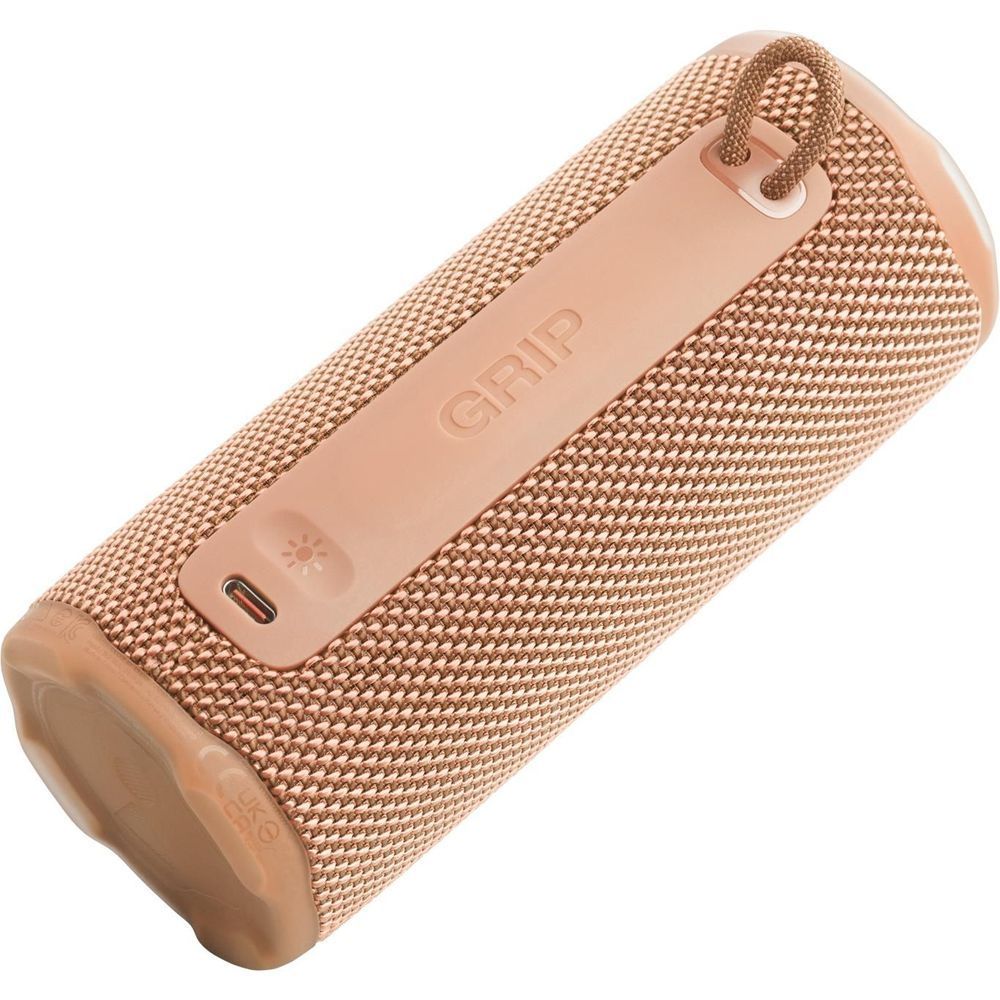 Portable JBL compact speaker rear side with GRIP label and charging port