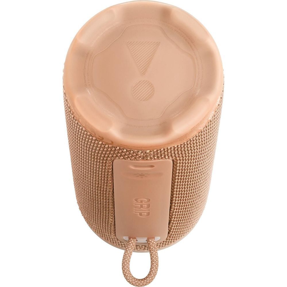 Portable JBL compact speaker bottom view with strap ring and charging cover