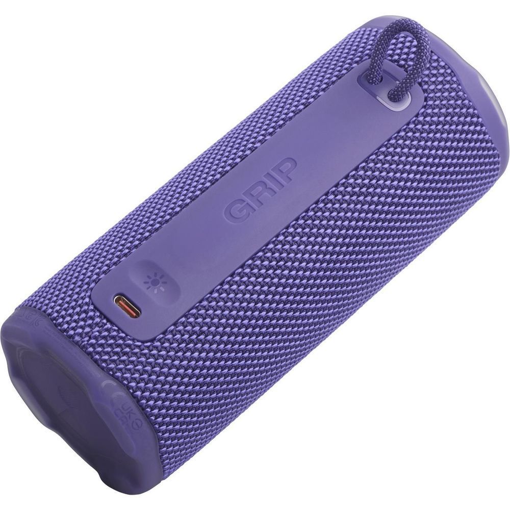 Purple JBL portable speaker side view with GRIP label and charging port