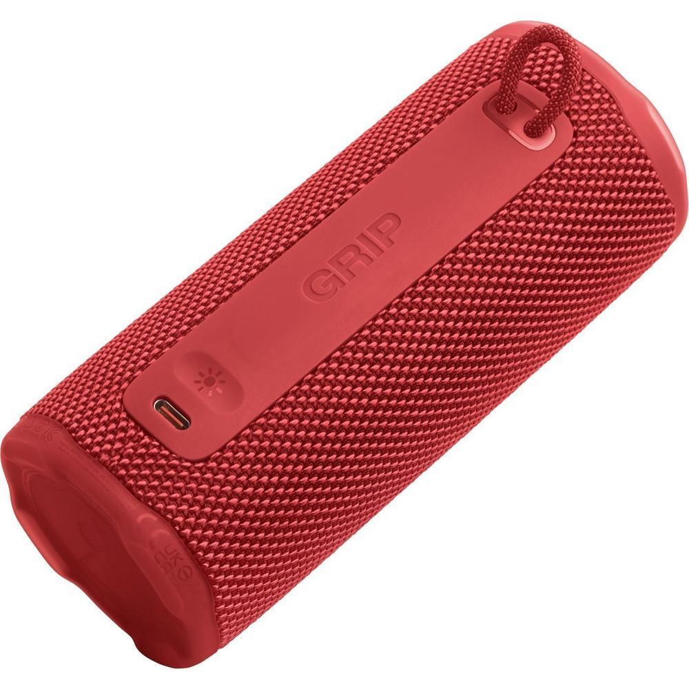 Red portable speaker back with GRIP label and small port cutout
