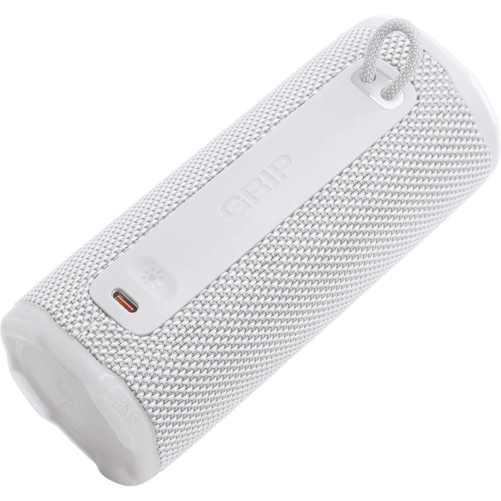White JBL portable speaker side panel with GRIP branding and charging port