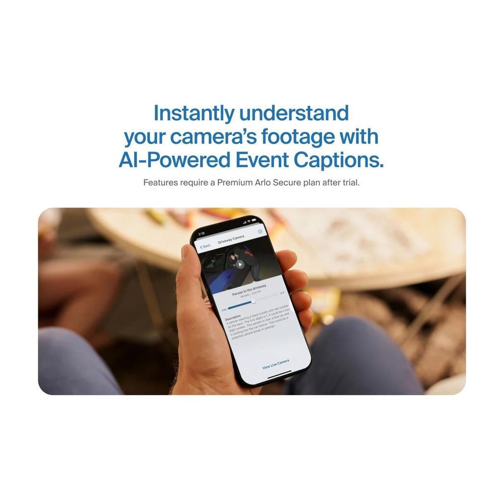 Smartphone displaying outdoor security camera event captions interface