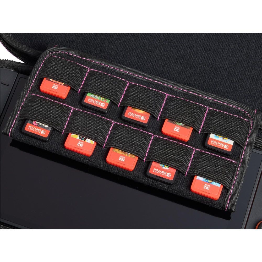 Close-up of black interior with multiple elastic cartridge slots and purple stitching.