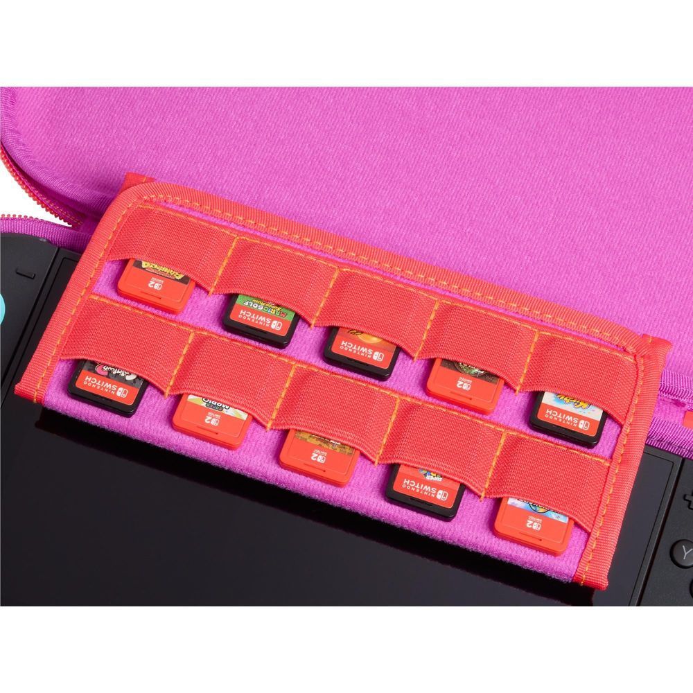 Close-up of orange accessory slots inside purple-lined slim game console case