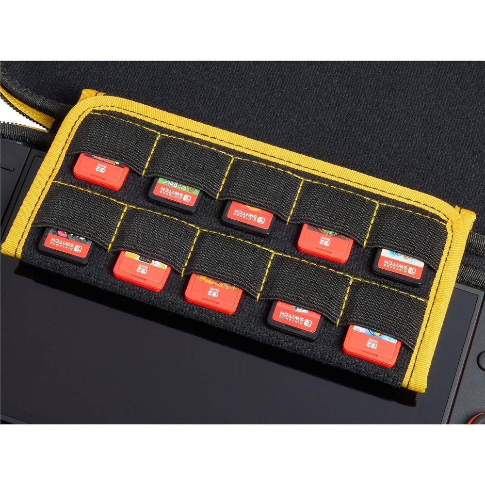 Close-up of black game card holder with yellow grid and red game labels