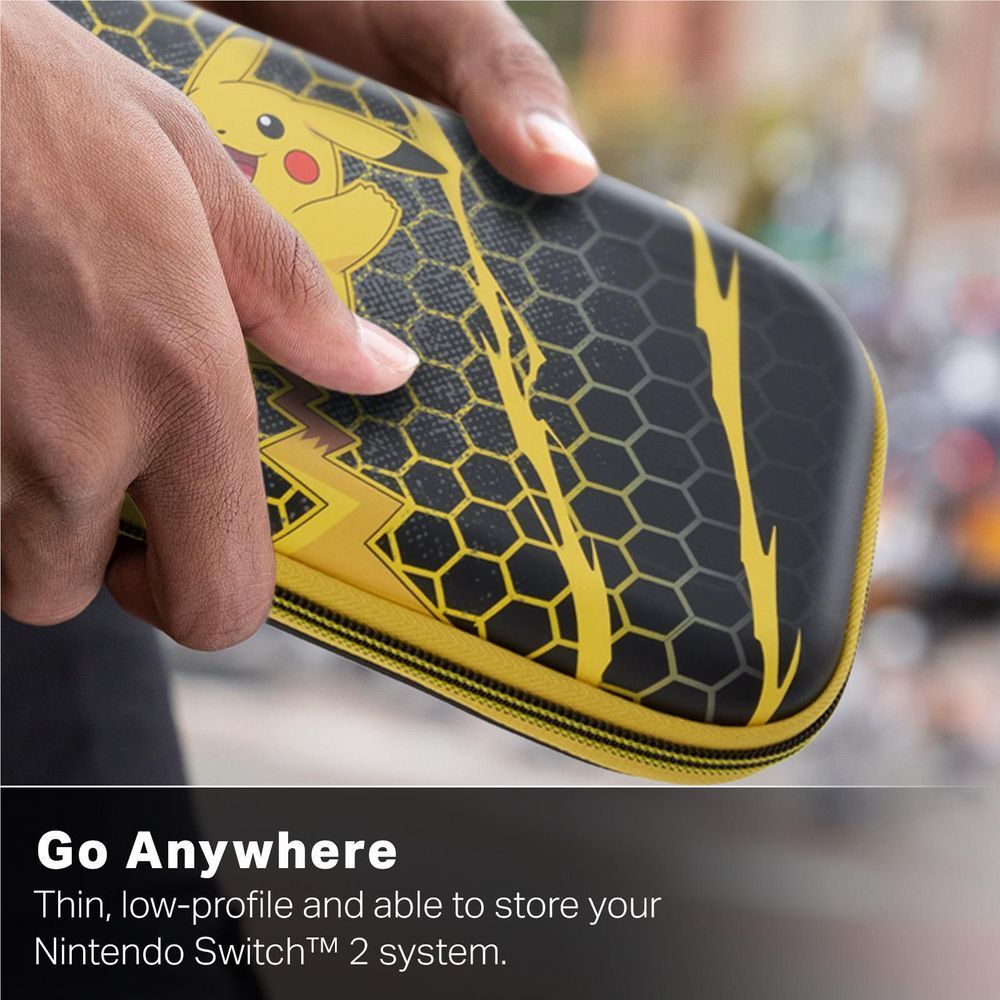 Hand holding slim Switch case with Pikachu storm hexagon print and yellow zipper