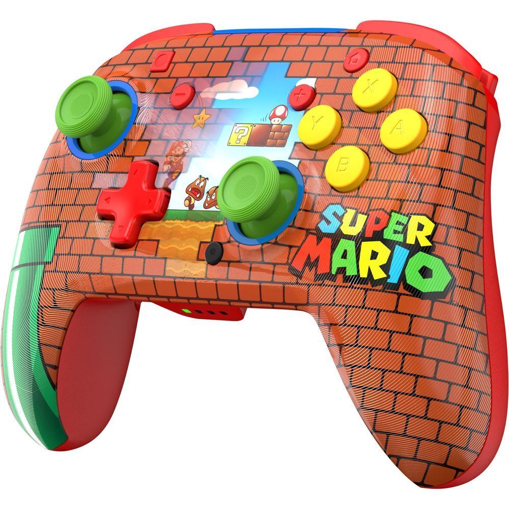 Wireless game controller with brick pattern, green thumbsticks, red D-pad, and Super Mario text