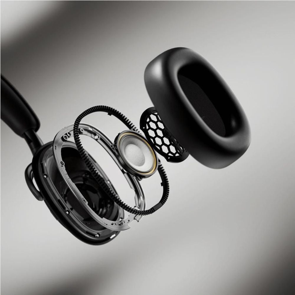 Opened over-ear headphones showing inner drivers and black speaker housing